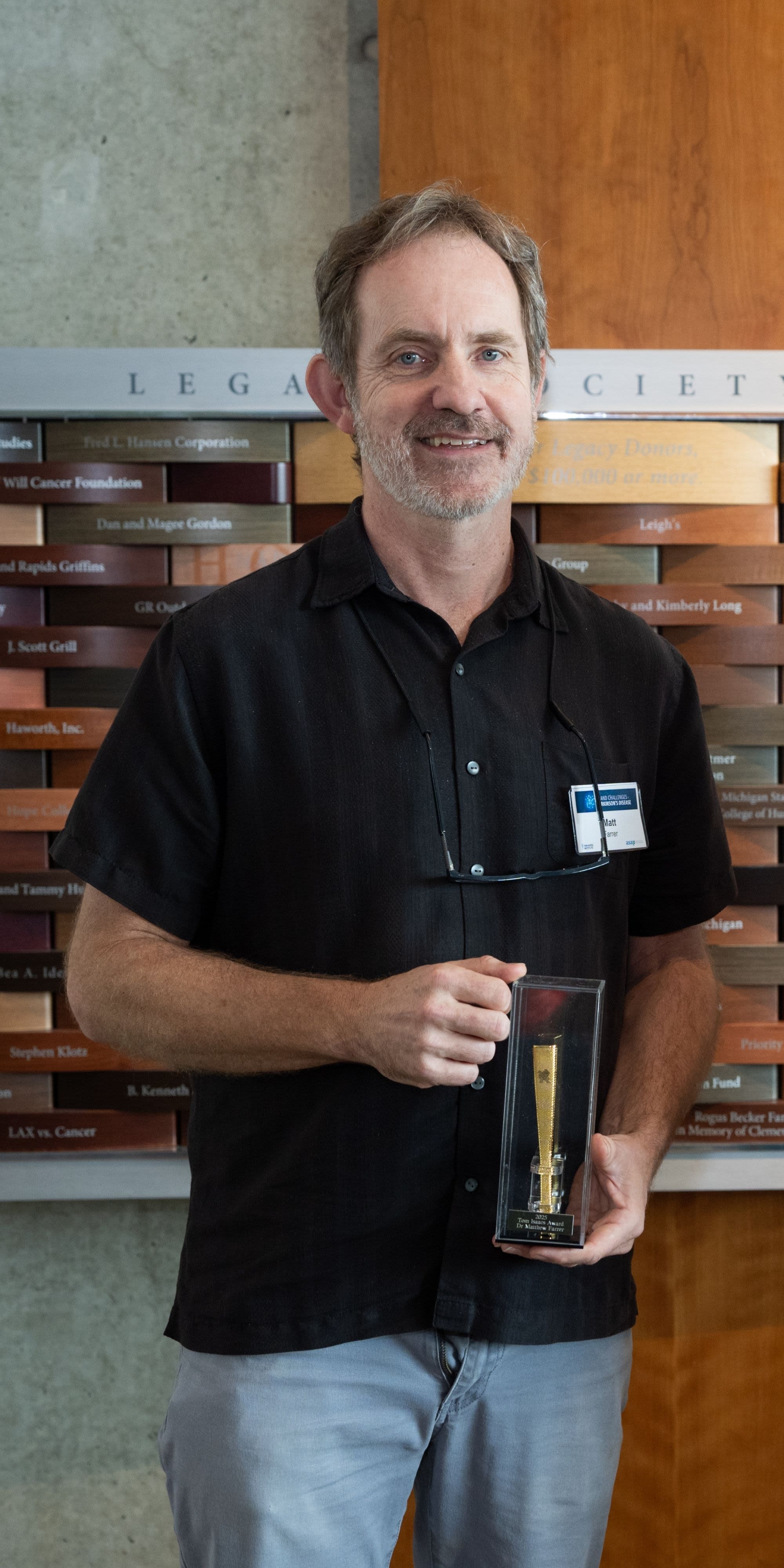 A headshot of Professor Matthew Farrer.